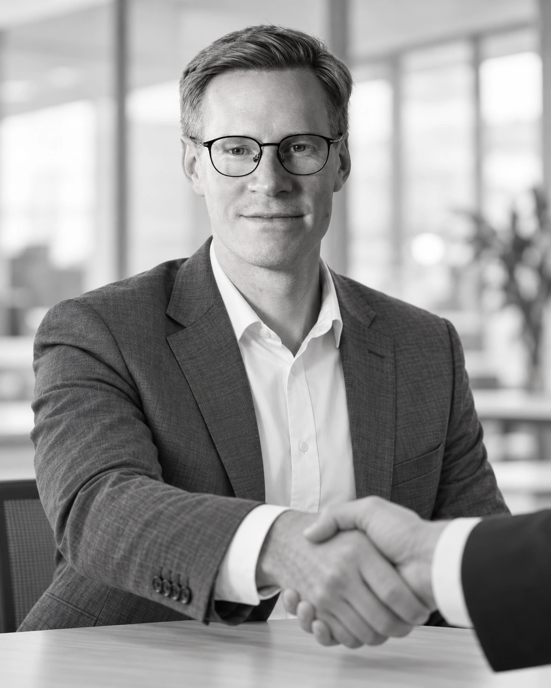 Adam Ljungrell shaking hands